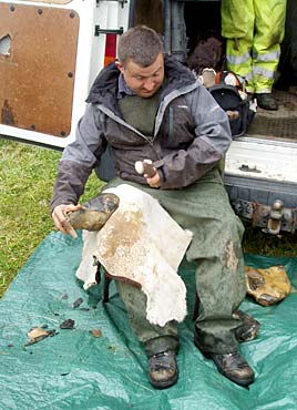 Hugo-demonstrates-the-art-of-flint-knapping Hugo demonstrates the art of flint-knapping.