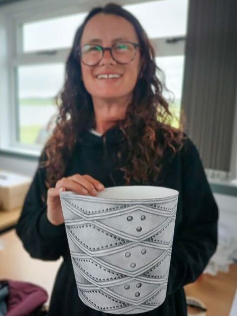 Joanne with the card replica of the decorated pottery vessel (see previous post) showing the original design and size. (📷 Anne Mitchell)
.
#Neolithic #OrkneyIslands #Orkney #VisitOrkney #Prehistoric Prehistory Archaeology Archeology Archaeologist NessOfBrodgar megalithic stenness excavation HeartOfNeolithicOrkney BritishArchaeology ArchaeologyLife scotland ScottishArchaeology